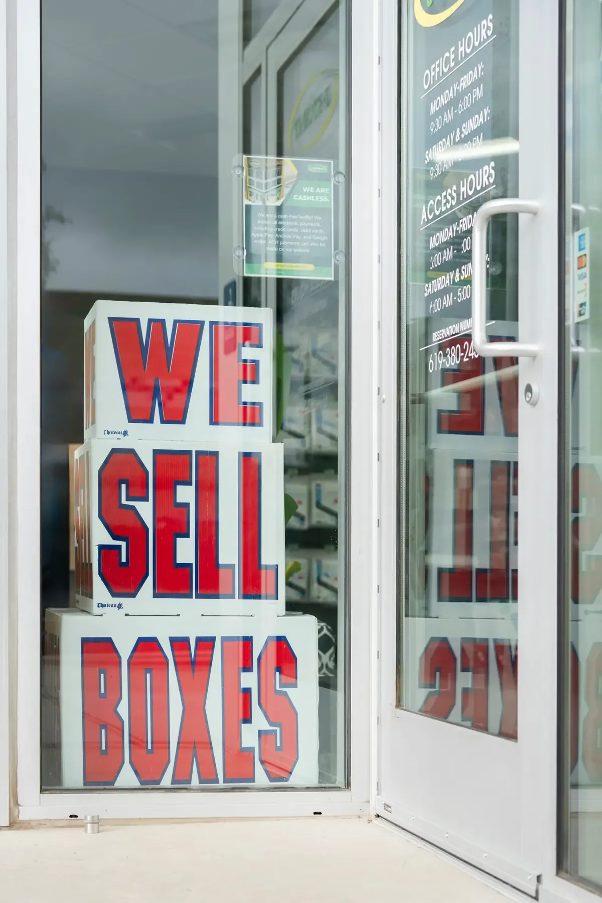 View of "we sell" sign at U-Stor-It self storage facility.