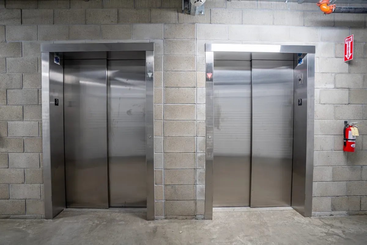 Interior of self storage facility, view of elevator.