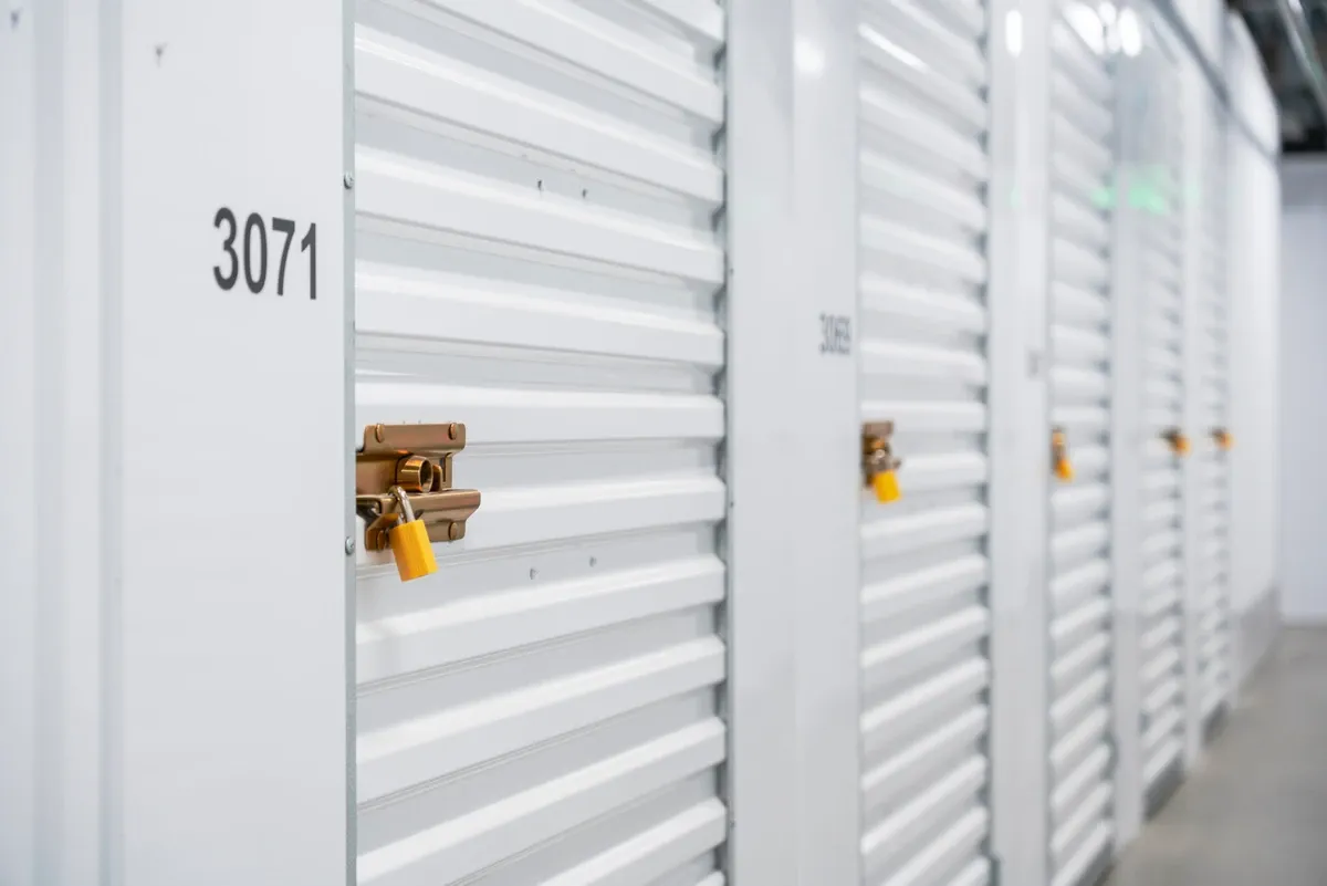 View of indoor storage units at U-Stor-It self storage facility, view of unit lock.